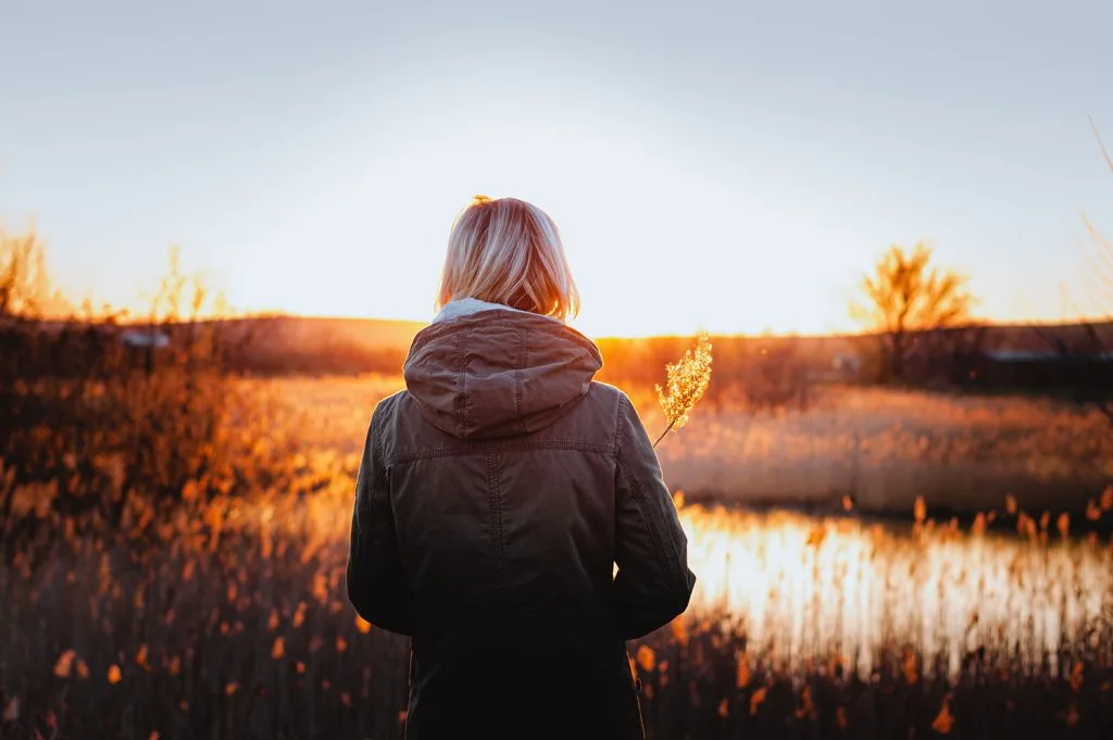Birth mother reflecting quietly at home after placement